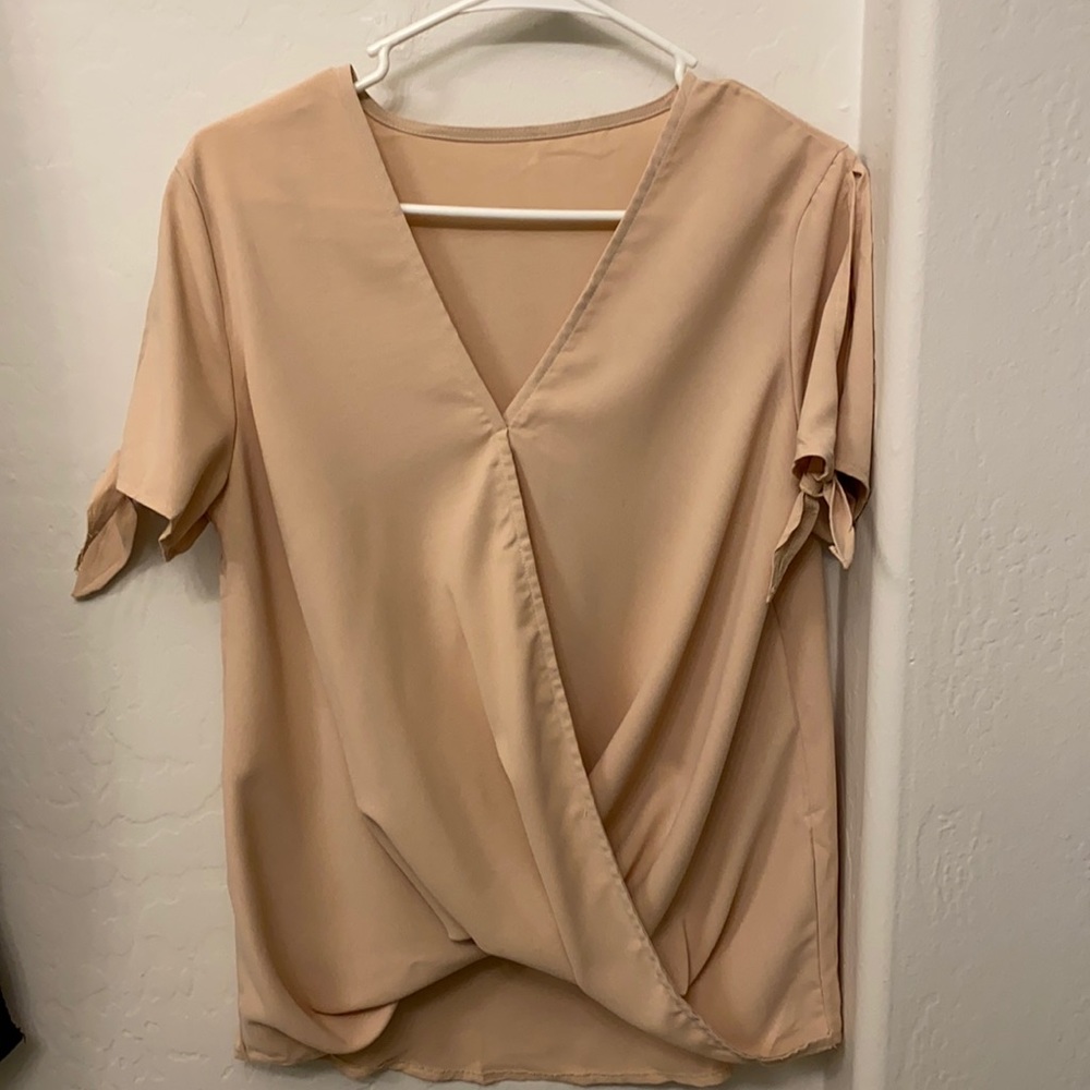 Blush color cute top runs a little big